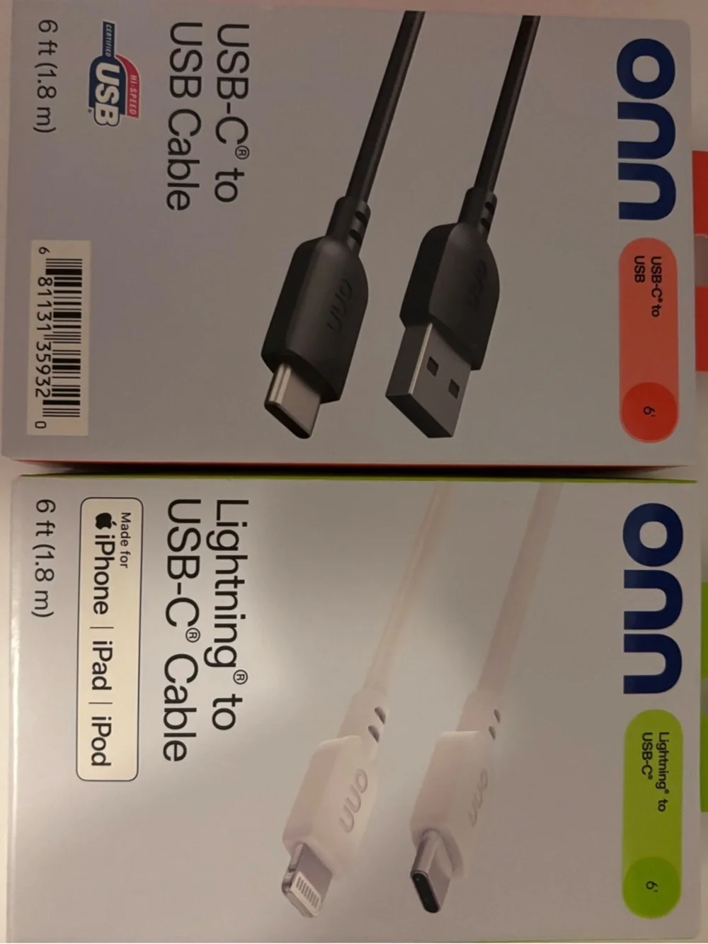 On Running USB-C and Lightning Cables — White with Green and Orange Accents